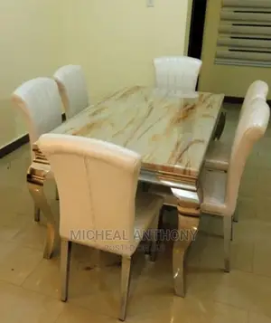 Marble Dining Table by Six With Quality Leather Chairs