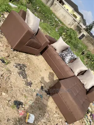 A Brown L Shape Sofa