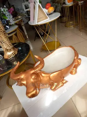 Golden Color Status of Cow Figurines