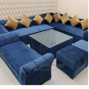 U-Shaped Sofa With a Center Table + Ottoman