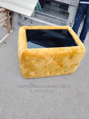 Upholstered Center Table With Glass Top