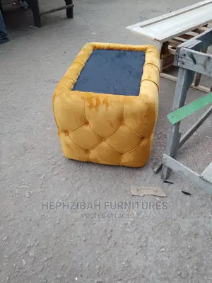 Upholstered Center Table With Glass Top
