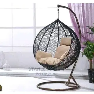 Modern Indoor/Outdoor Rattan Made Hanging Swing Chair.