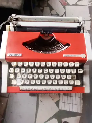 Olympis Portable Manual Typewriter (Inside Box)