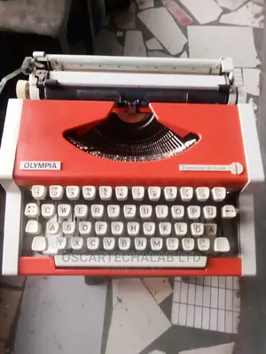 Olympis Portable Manual Typewriter (Inside Box)