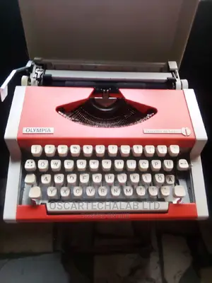 Olympis Portable Manual Typewriter (Inside Box)