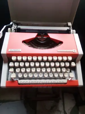Olympis Portable Manual Typewriter (Inside Box)