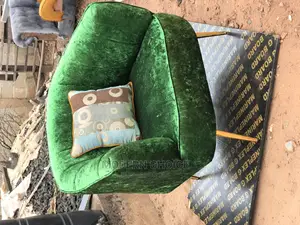 Single Seater Arm Chair With Throw Pillow Up for Grab
