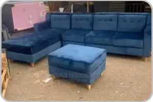 Blue L- Shaped Fabric Sofa With Center Table