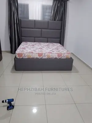 6 X 6 Upholstered Leather Bedframe With Bedside Drawer
