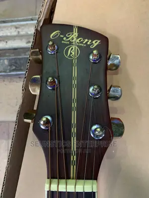 Quality O- Bong Acoustic Guitar
