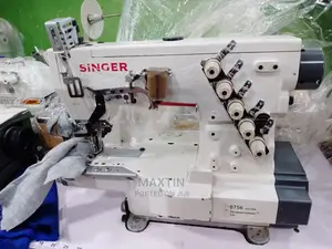 Singer Taping Machine