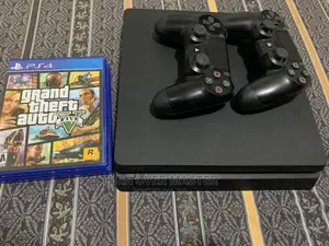 SONY Play Station 4 With Extra PAD and 10 Loaded Games.
