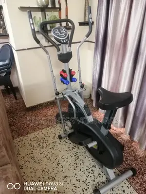 Exercise Bike With Dumbells and Waist Twister