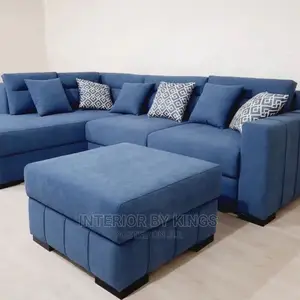 L-Shaped Fabric Sofa With a Center Ottoman