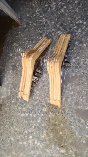 A Pack of Wooden Clip Imported Hangers
