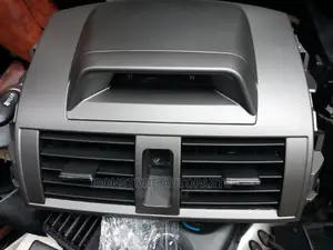 AC Vent With Clock - Corolla 2010 - 2012