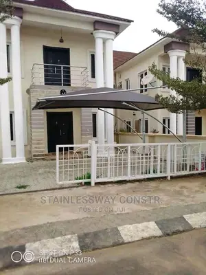 Carport Brown Net Galvanized Pipes