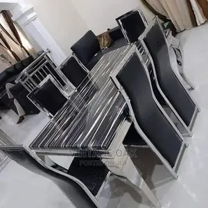 Classic Dining Table With 6 Luxury Chairs in Black Colours.