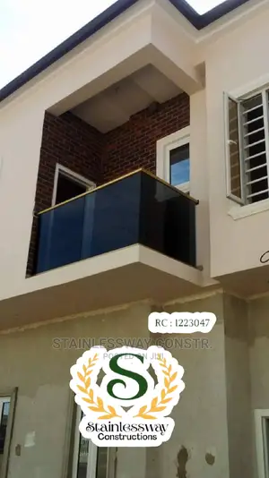 Dark Grey Balcony Glass Railing With Gold Top Frame