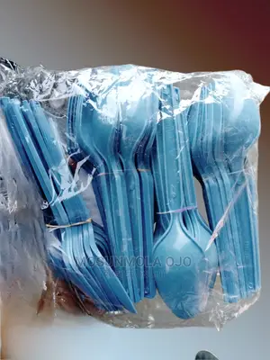 A Bag of Colored Plastic Disposable Spoons