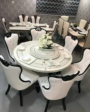 Round Versace Marble Dinning Table With Six Leather Chairs