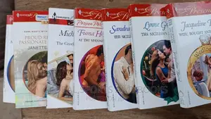 Harlequin Present Red and White Romance Novel
