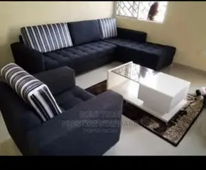 A Standard 7 Seater Sofa With a Center Table