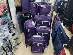 Set of Purple Swiss Polo Traveling Luggage