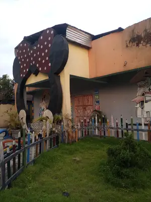 A School Bungalow of Nine Rooms