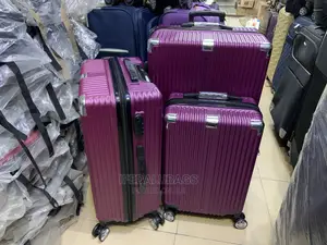 Set of Purple Durable Plastic Traveling Luggage
