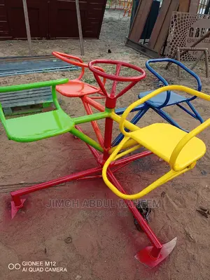Marryys Go Round, Slides, Swing, And Ziqsor.
