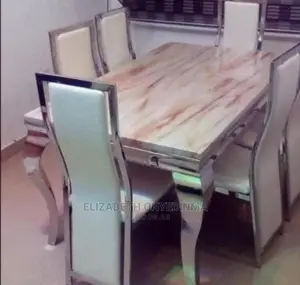 Modern 6 Seater Marble Top Dinning Set.