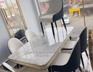 Luxurious Marble Dinning Table With Six Leather Chairs