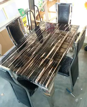 Luxurious 4 Seater Marble Top Royal Dinning Set.