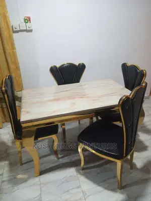 Luxurious Marble Dinning Table With Four Leather Seats Gold