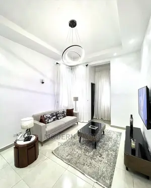 4 Seater Plane Sofa With Throw Pillows Up for Grab