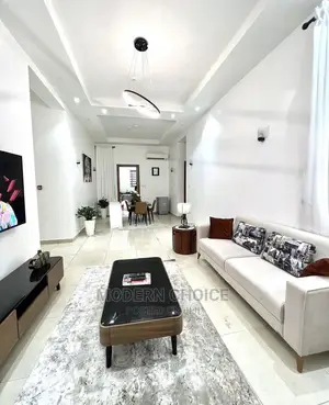 4 Seater Plane Sofa With Throw Pillows Up for Grab