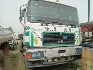 Man Diesel Ten Tyres Truck Head With Flat Body Registered
