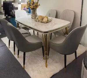 Royal Dinning Table With Six Leather Chairs