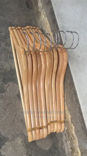 Bundles of Wooden Hangerz for Clothing Display