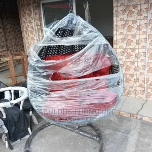 Quality Rattan Made Indoor/Outdoor Hanging Swing Chair.
