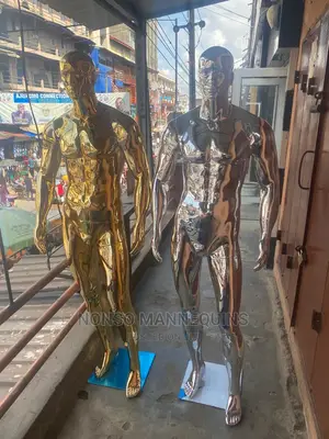 Huge Male Gold And Silver Chrome Mannequin With Face