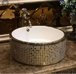 White And Gold Counter Top Basin
