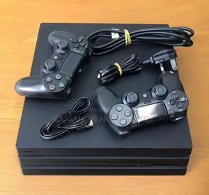 Neat Playstation 4 Pro With 2controllers, All Accessories.