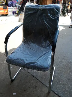 Pardded Leather Visitors Chair.