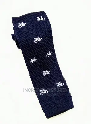 Knitted Tie With Animals Image Dot on It