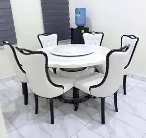 Round Versace Marble Dinning Table With Six Leather Chairs
