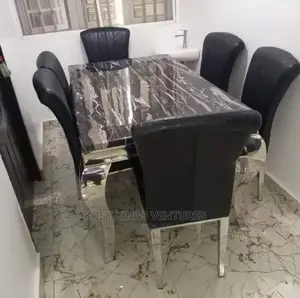 Luxurious Marble Dinning Table With Six Leather Chairs