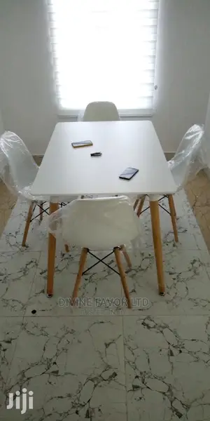 4 Seater White Dinning Set .